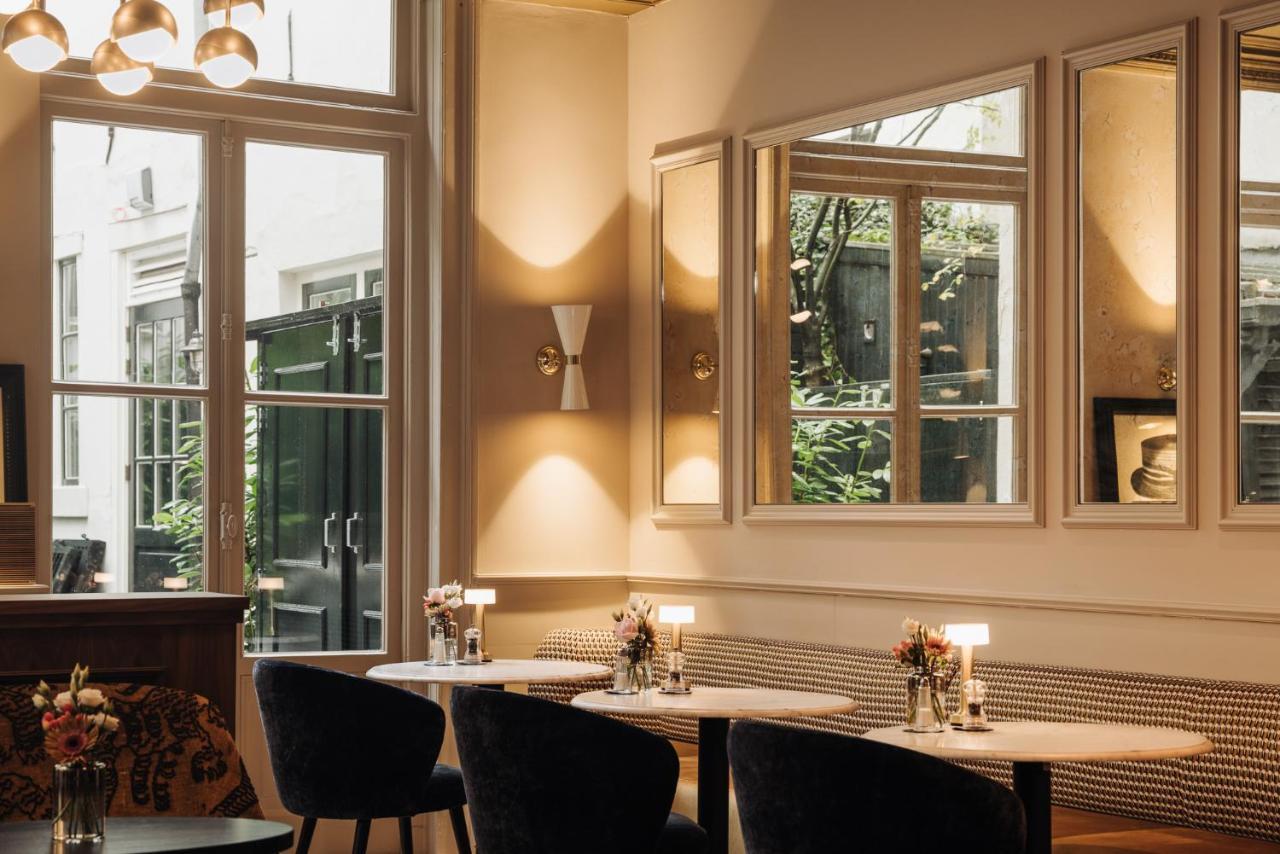 Hotel 717 Amsterdam Bagian luar foto The interior of the restaurant