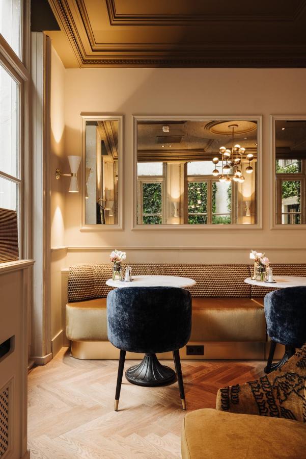 Hotel 717 Amsterdam Bagian luar foto The interior of the restaurant