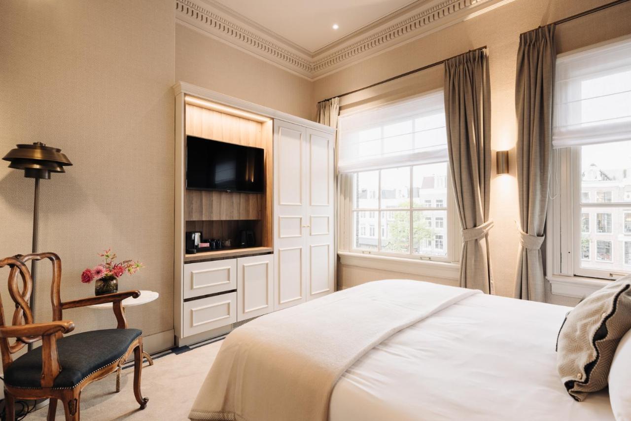 Hotel 717 Amsterdam Bagian luar foto A bedroom at the hotel