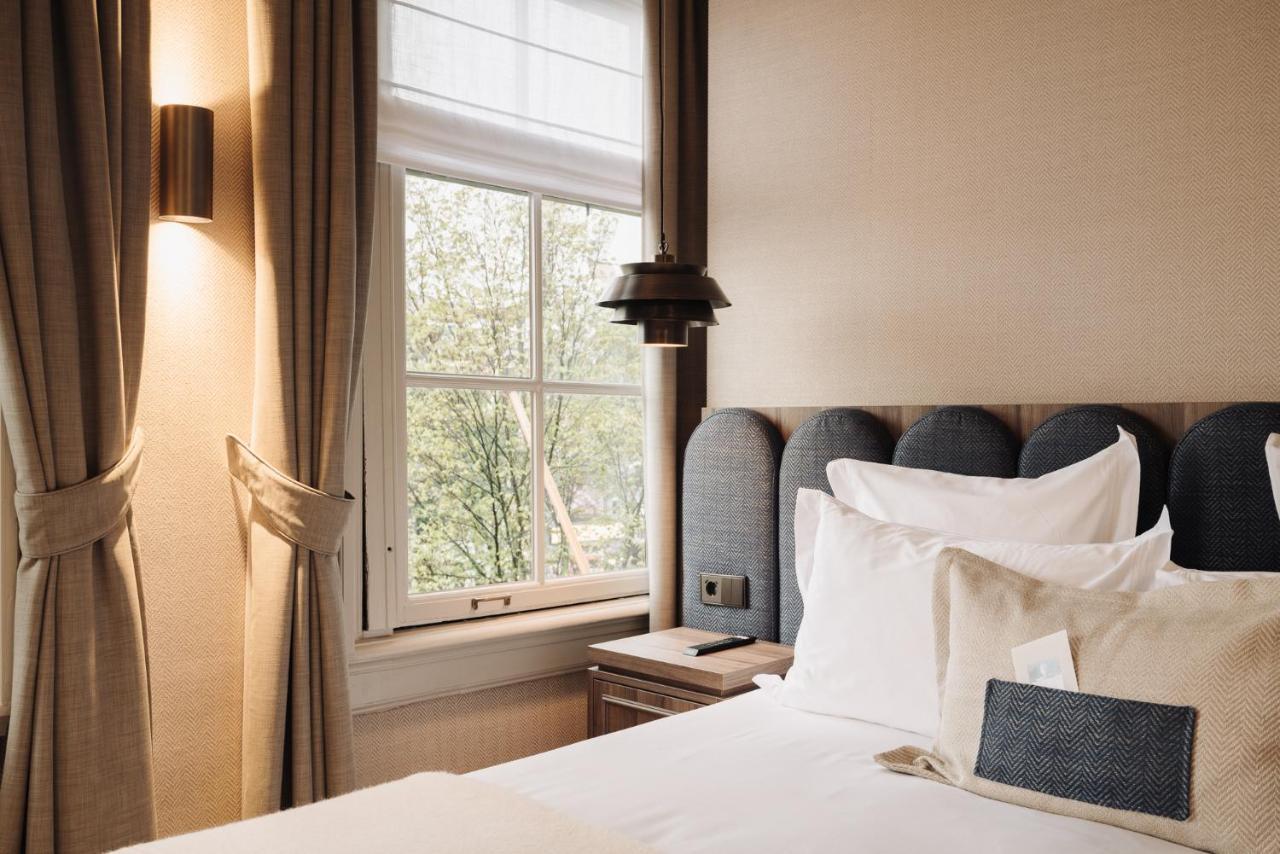 Hotel 717 Amsterdam Bagian luar foto A bedroom at the hotel