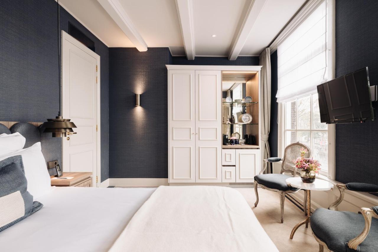 Hotel 717 Amsterdam Bagian luar foto A room at the hotel