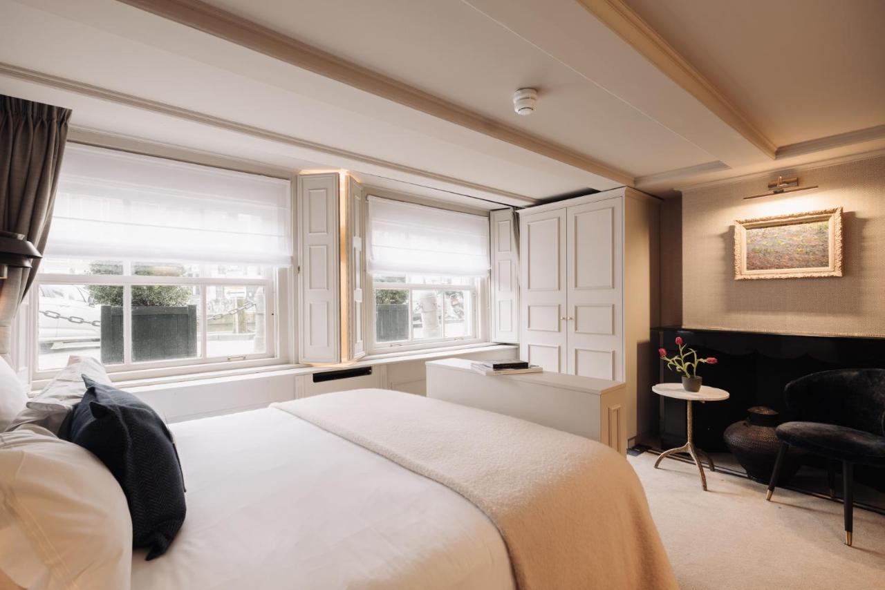 Hotel 717 Amsterdam Bagian luar foto A room at the hotel
