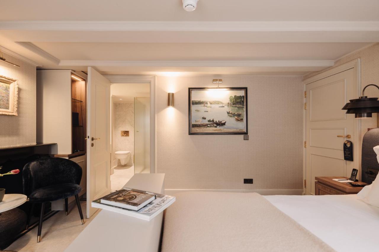 Hotel 717 Amsterdam Bagian luar foto A room at the hotel